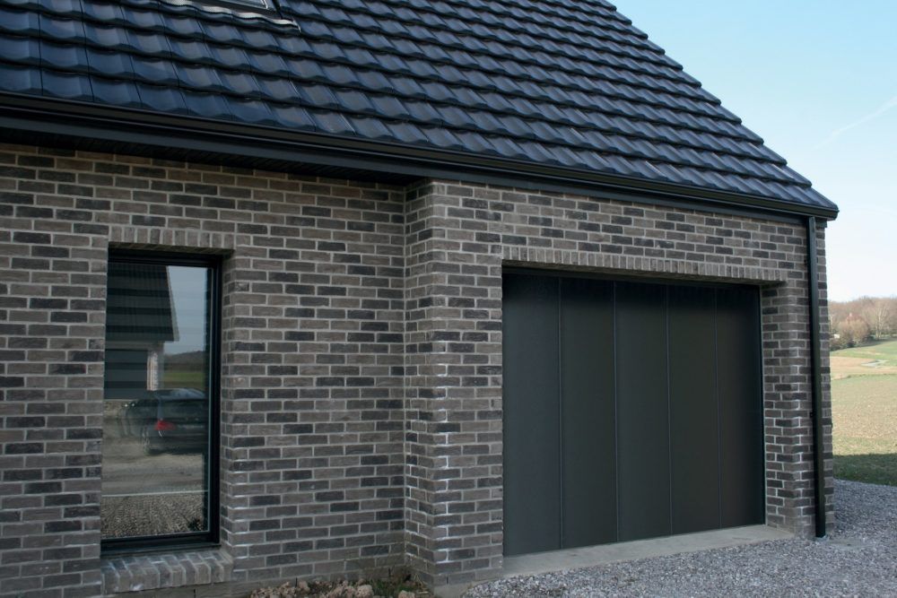 Installation d'une porte de garage avec ouverture latérale